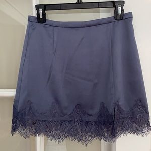 Urban Outfitters mini lace slip skirt.